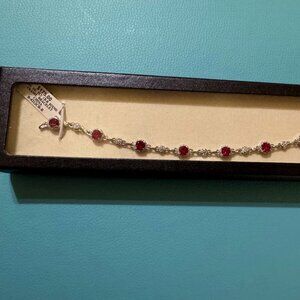 Silver Plated Ruby Tennis Bracelet w/ Lobster Clasp Closure